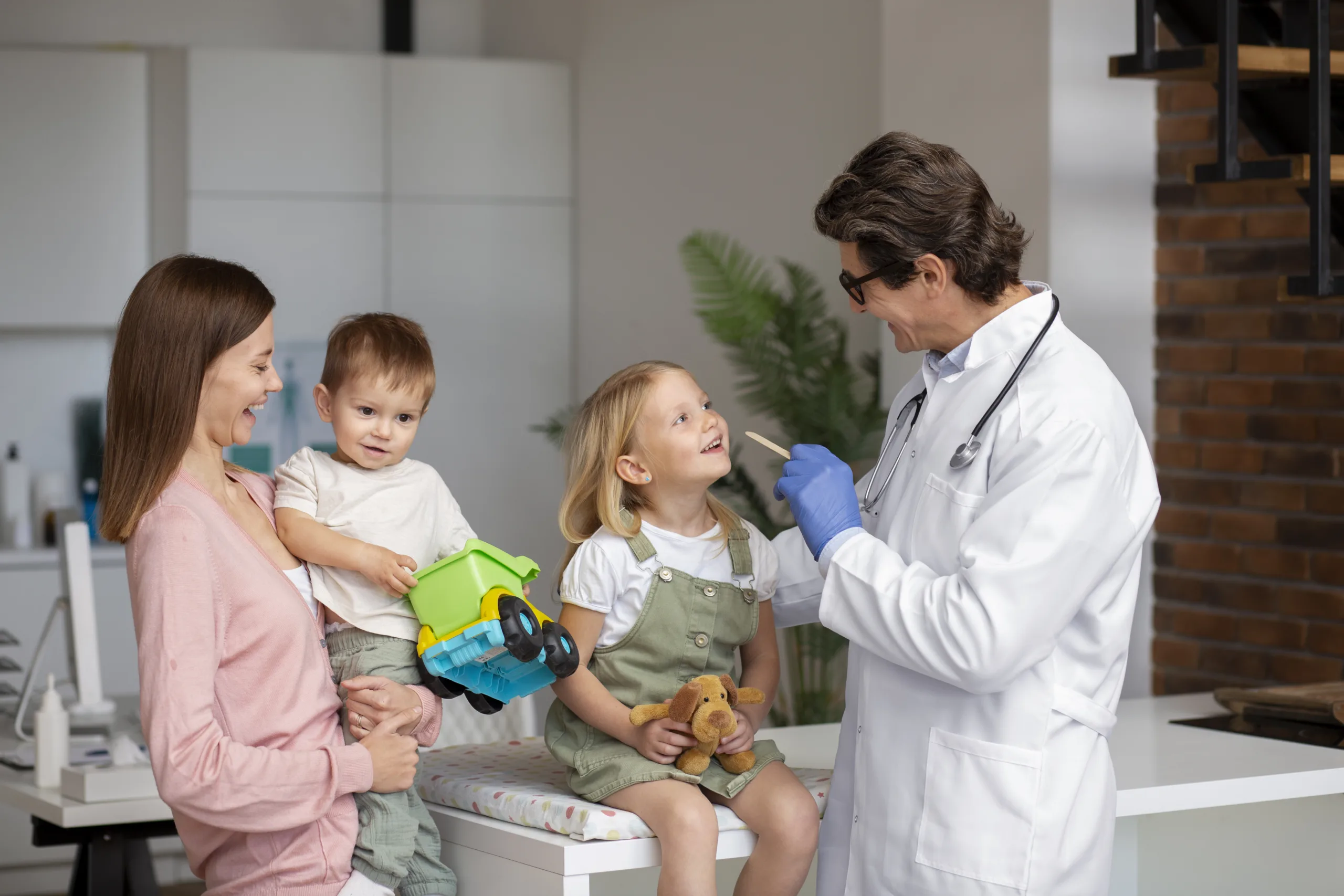 12.young-mother-with-two-children-doctors-appointment mama cu doi copii la doctor